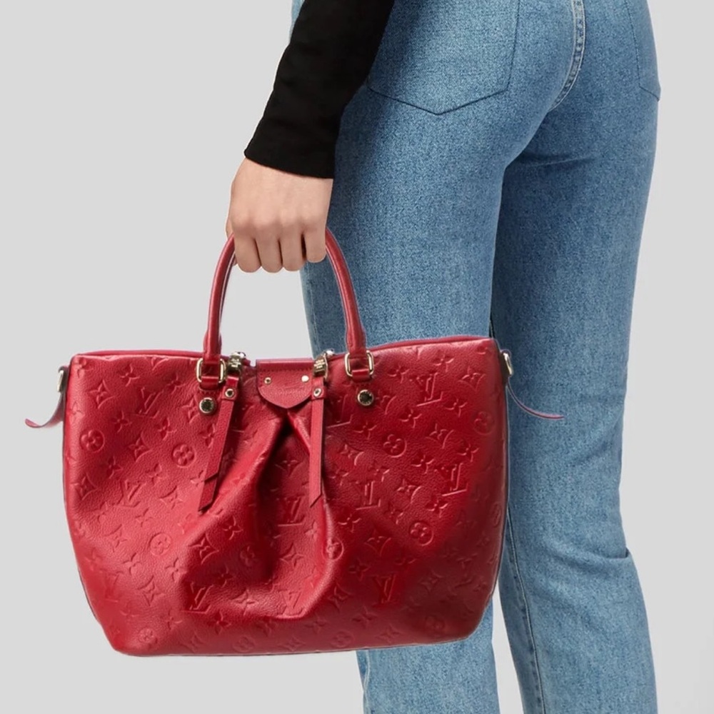 Louis Vuitton Red Tote Bag with Luxurious Finish